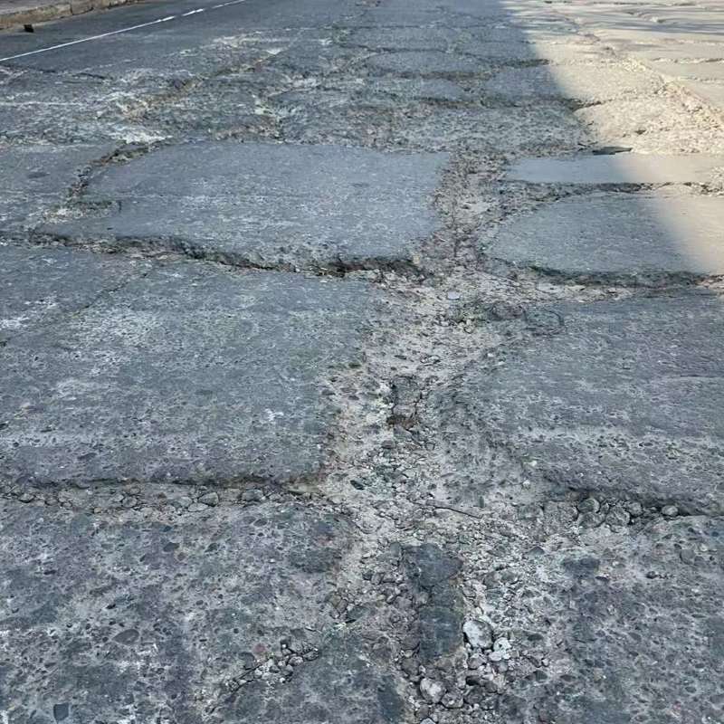 萝北路面起砂露石子修补料
